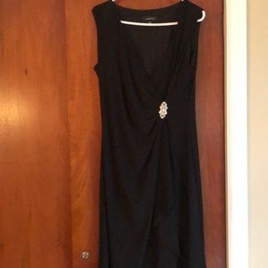 Black cocktail dress with front rhinestone!
